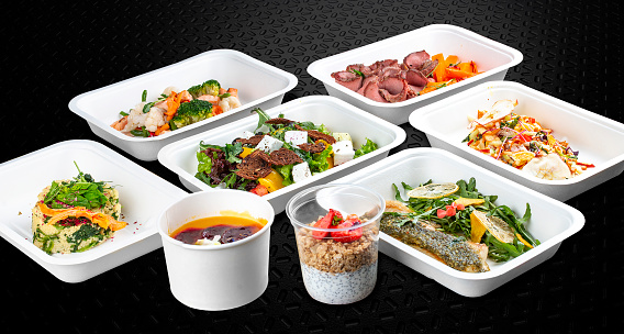 Colorful and nutritious meal kits prepared in eco-friendly containers for a convenient and healthy on-the-go meal.