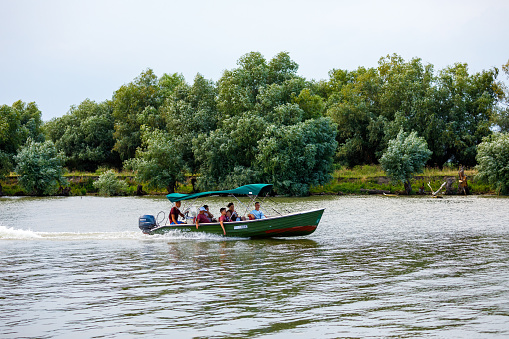 Mila 23, Tulcea, Romania - June 21, 2022: Touristboats in the Danube Delta of Romania