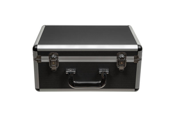istock Black padded aluminum briefcase case with metal corners.  Case with foam inside. Isolate on a white background. 1992259127