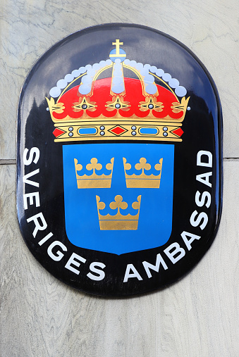 Copenhagen, Denmark - October 22, 2023: Close-up view of the Embassy of Sweden sign.