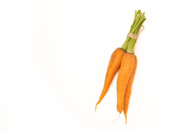Bunch of fresh carrots isolated on a white background