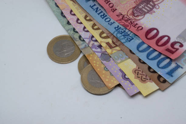 istock Hungarian banknotes and coins on a table 1992290360