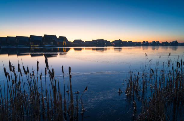 A new suburb at the waterfront on a cold, winters morning in Meerstad, the Netherlands.
