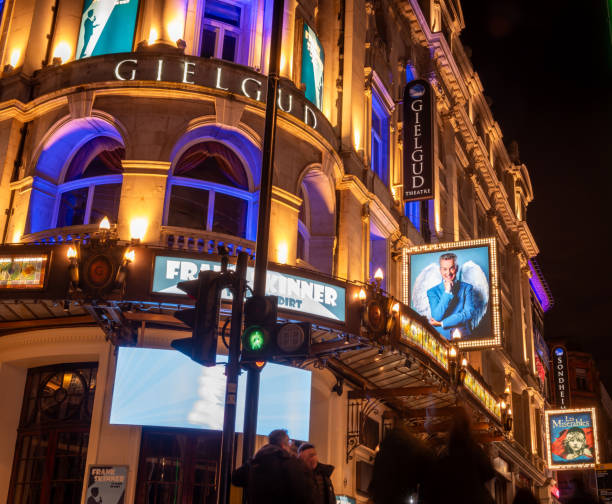 London. UK- 02.04.2024. The name sign and facade of the Gielgud Theatre on Shaftesbury Avenue at night.