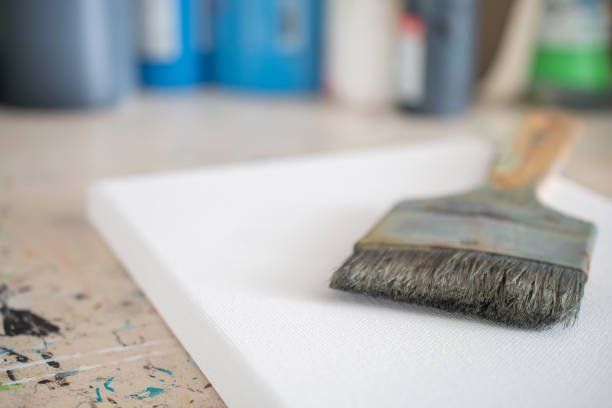 painting lessons, canvas with paints, brushes and other elements for painting