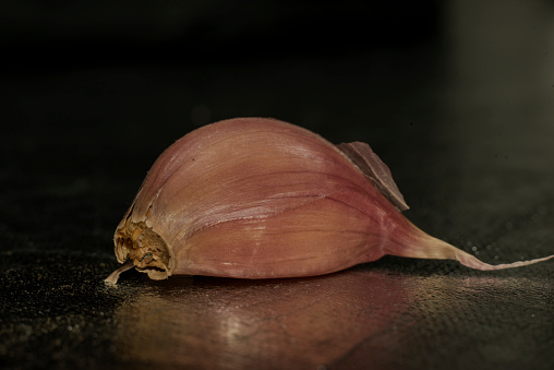 Garlic close-up on the dark background