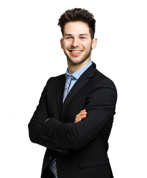 istock Smiling businessman against white background 1992369989