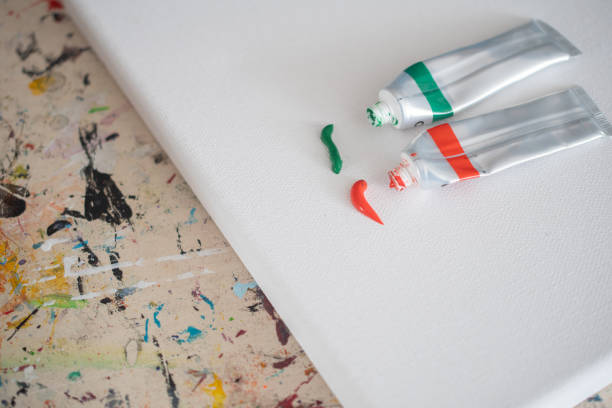 painting lessons, canvas with paints, brushes and other elements for painting