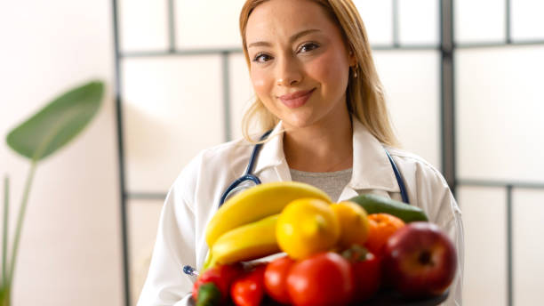 istock dietitian woman preparing  food 1992384090