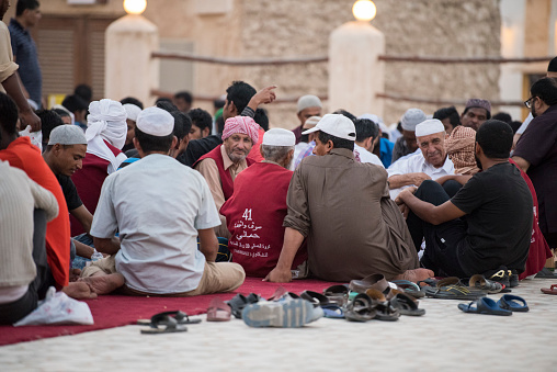 Doha, Qatar, April 15, 2023 : Iftar during Ramadan in the courtyard of the mosque in Doha, Qatar.