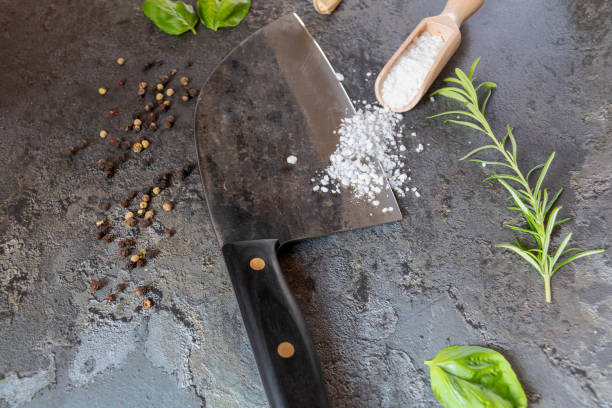 istock Salt on a knife and wooden spoon 1992412528