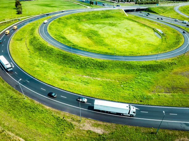 istock Traffic on a highway junction seen from above 1992446705