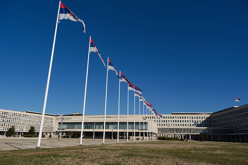 Palace of Serbia, Novi Beograd district. A lot of Flags of Serbia waiving in front of Palata Srbija. Office of various state administrations in Belgrade