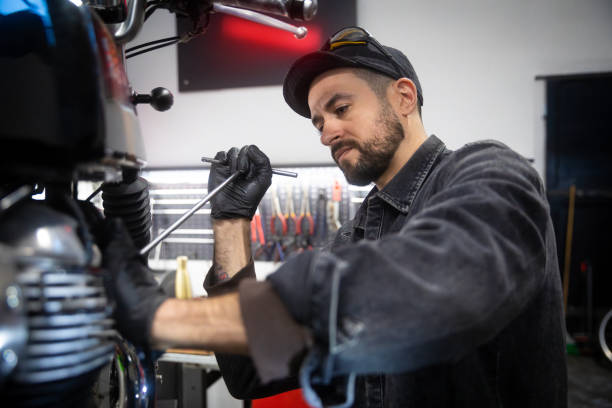 istock Mechanic working on a motorbike 1992490768