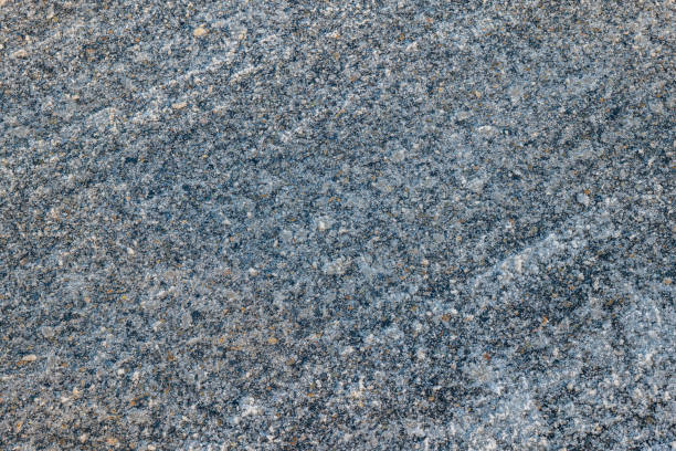 Winter's slippery ice-frozen road surface