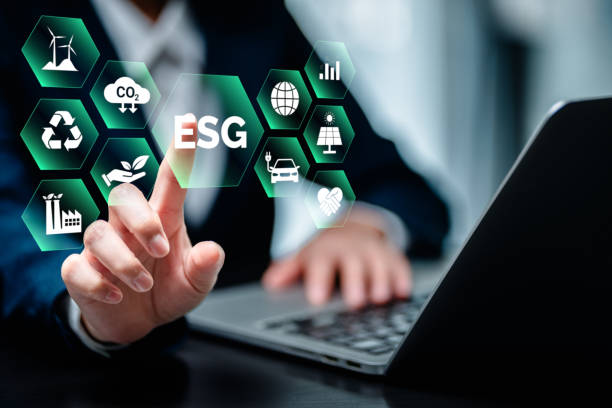 istock Businesswomen using laptop computers with ESG icon concepts for Environment, Social, Governance, net zero, carbon neutrality goals, development business sustainable environment concept. 1992518522