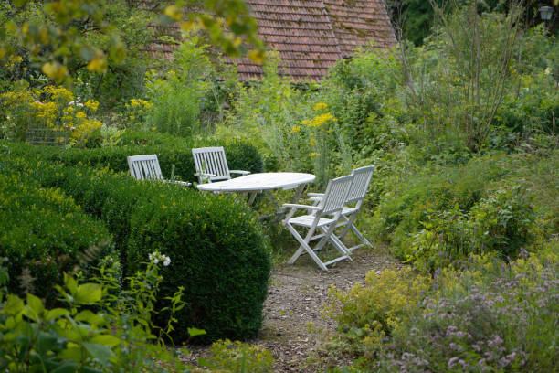 istock Benches and chairs at tables invite you to relax 1992532387