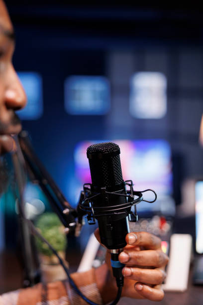 istock Male presenter recording live talk show 1992546516