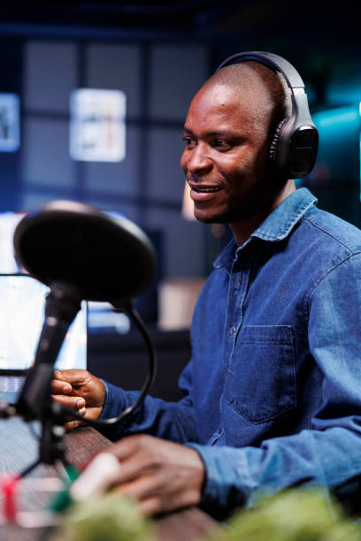 istock Male blogger creating talk show at home 1992549874