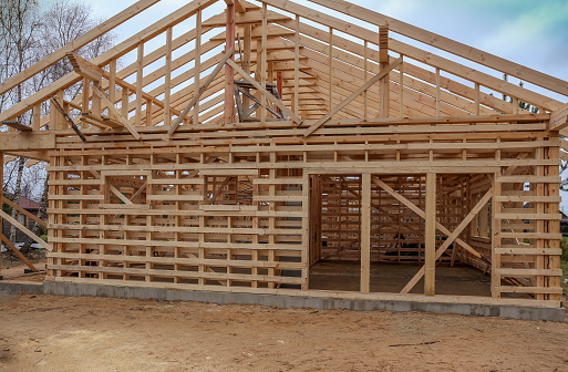 Building a timber frame house. Wooden consruction