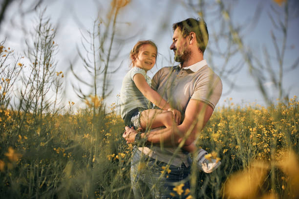 istock Father and daughter enjoying nature 1992556584