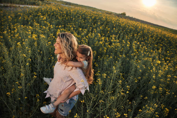 istock Mother and daughter enjoying nature 1992557094
