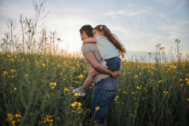 istock Father and daughter enjoying nature 1992558723