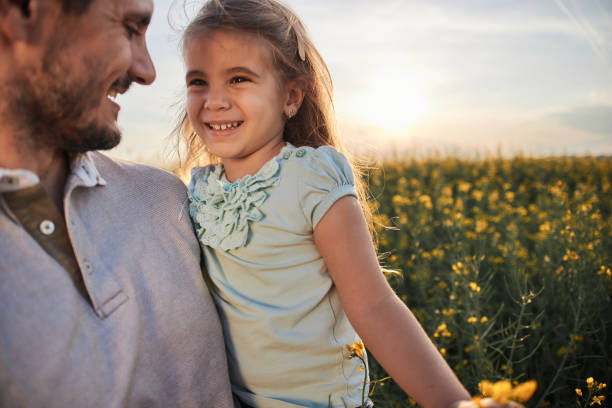 istock Father and daughter enjoying nature 1992559205