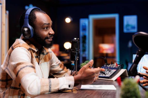 istock Black man conducting online radio show 1992565040