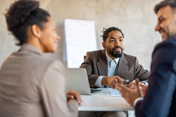 istock Couple meet with a financial planner 1992568409