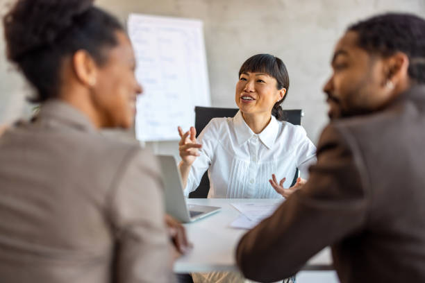 istock Business people talking in meeting 1992573931
