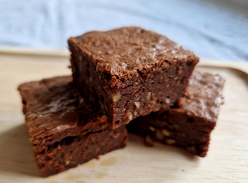 chocolate brownie, or simply a brownie, is a chocolate baked confection. Brownies come in a variety of forms and may be either fudgy or cakey, tea, fruit, chopping desk, pour