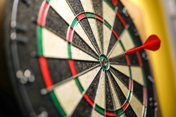 istock Scoring and Winning Points on the Dartboard, Aiming, Accuracy, Success 1992584761
