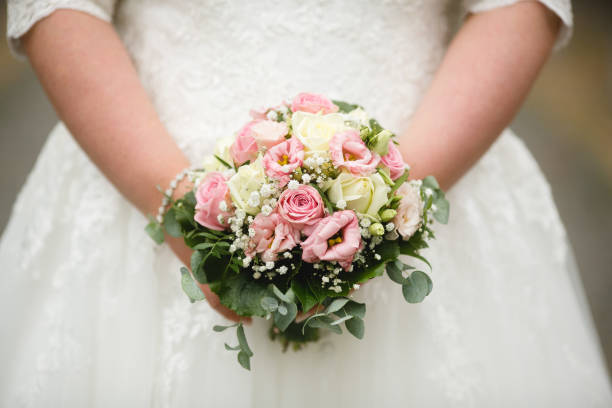 istock wedding flowers bride bouquet groom 1992588465