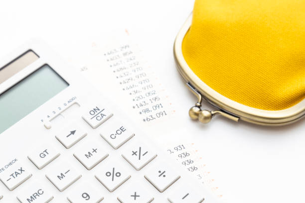 istock Calculator, wallet and bankbook. 1992606935