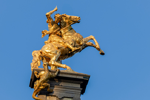 Statue of St George and the Dragon on the roof of a building in Antwerp, Belgium