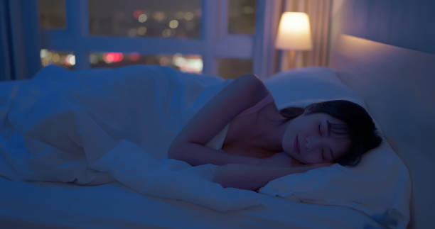 istock asian woman night sleep deeply 1992617948