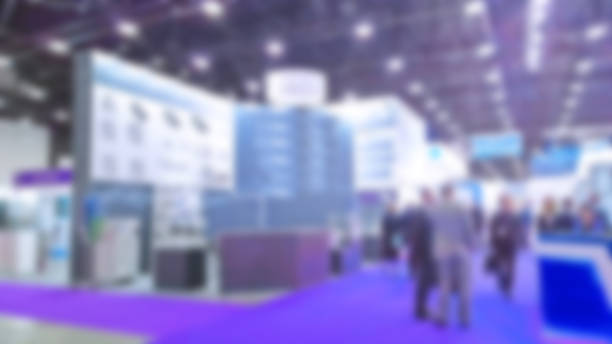 Abstract blur people in trade show background. New modern exhibition, convention and conference expo centre. Venue for holding business. Financial and economic growth and crisis concept. Collaboration Abstract blur people in trade show background. New modern exhibition, convention and conference expo centre. Venue for holding business. Financial and economic growth and crisis concept. Collaboration press conference stock pictures, royalty-free photos & images