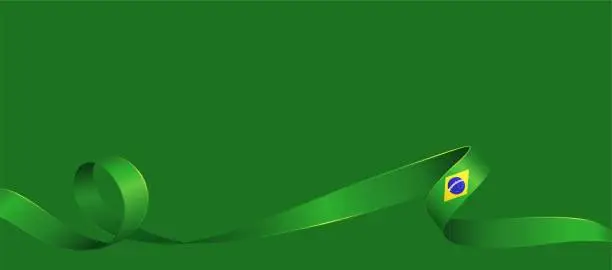 Vector illustration of Brazilian flag ribbon. Curly ribbon on green background.