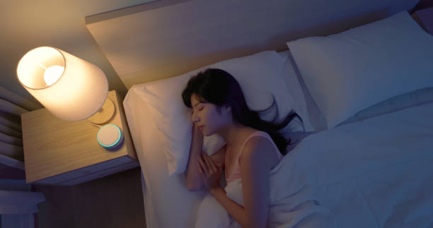 istock asian woman use white noise 1992623438