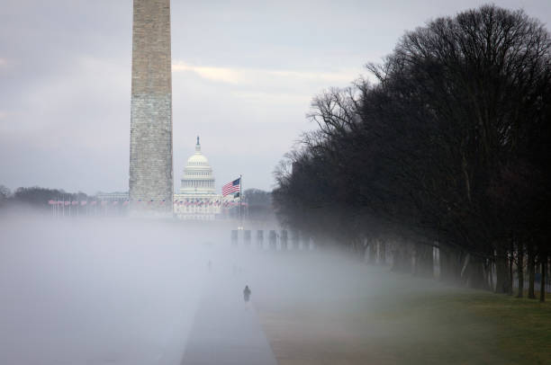 Lone runner in the mist on the National Mall, Washington DC