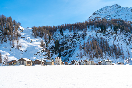 The village of Isola in winter, on Lake Sils, Engadin, Switzerland.