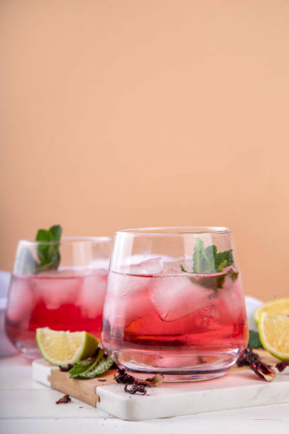 istock Hibiscus margarita drink with ice, lime and mint 1992654493