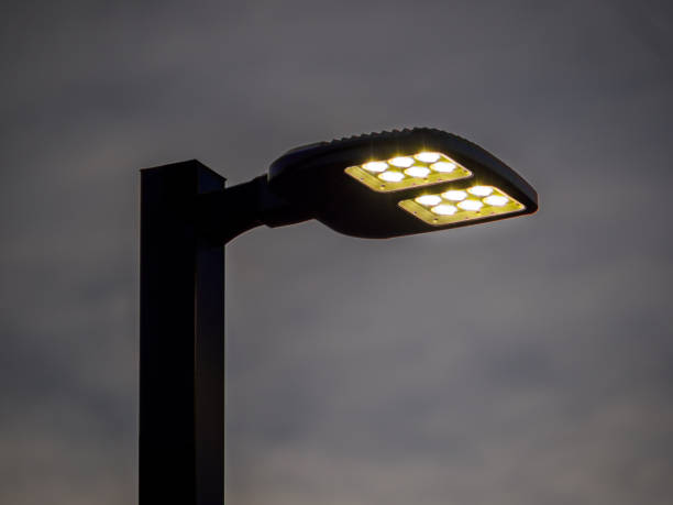 istock LED street light against a dark overcast sky. 1992660957