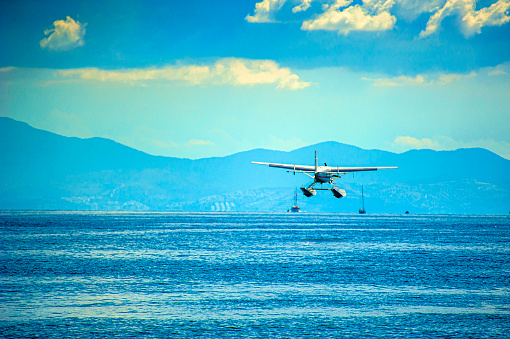 Float plane landing on the sea