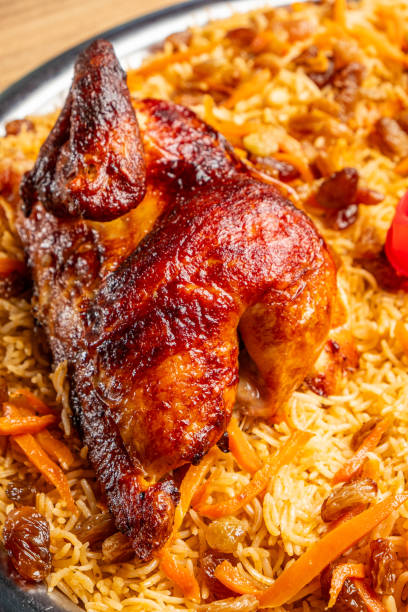 istock Bukhari rice mansaf with grilled chicken 1992688144