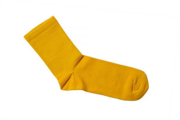 istock Fashionable yellow socks on a white background 1992703564