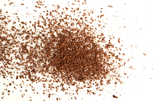 Grated Chocolate Pile Isolated, Crushed Chocolate Shavings, Crumbs, Scattered Flakes, Cocoa Sprinkles for Desserts Decoration on White Background