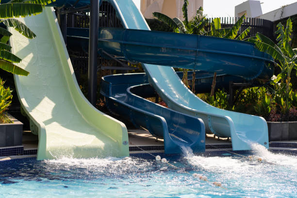 istock Blue swimming pool with water slide. 1992730266