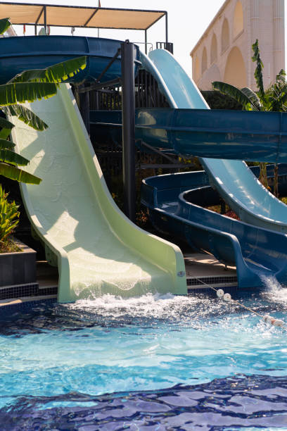 istock Blue swimming pool with water slide. 1992730268